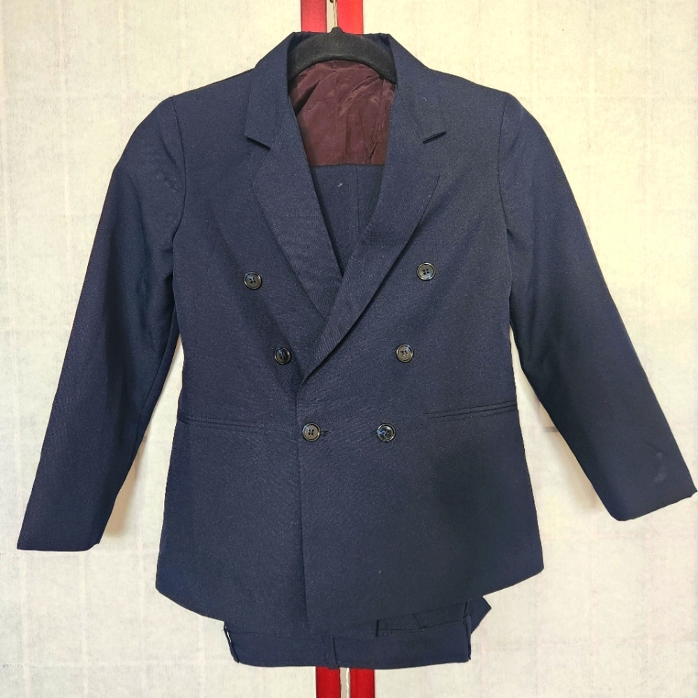 NWOT Navy blue double-breasted 2-piece suit. Kid's size 10.